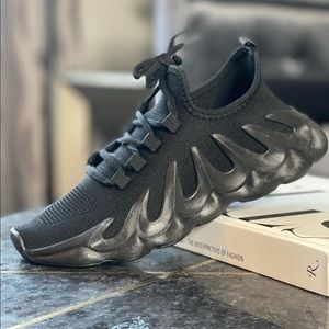 NEW w/box. Black designer inspired sneaker.